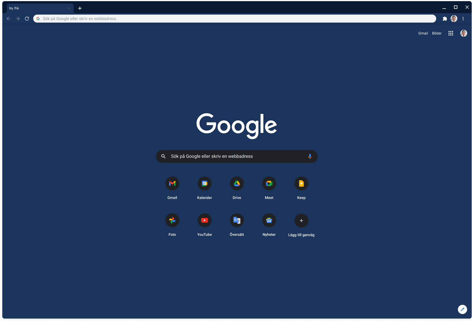 Ett webbläsarfönster i Chrome visar Google.com med temat Slate.